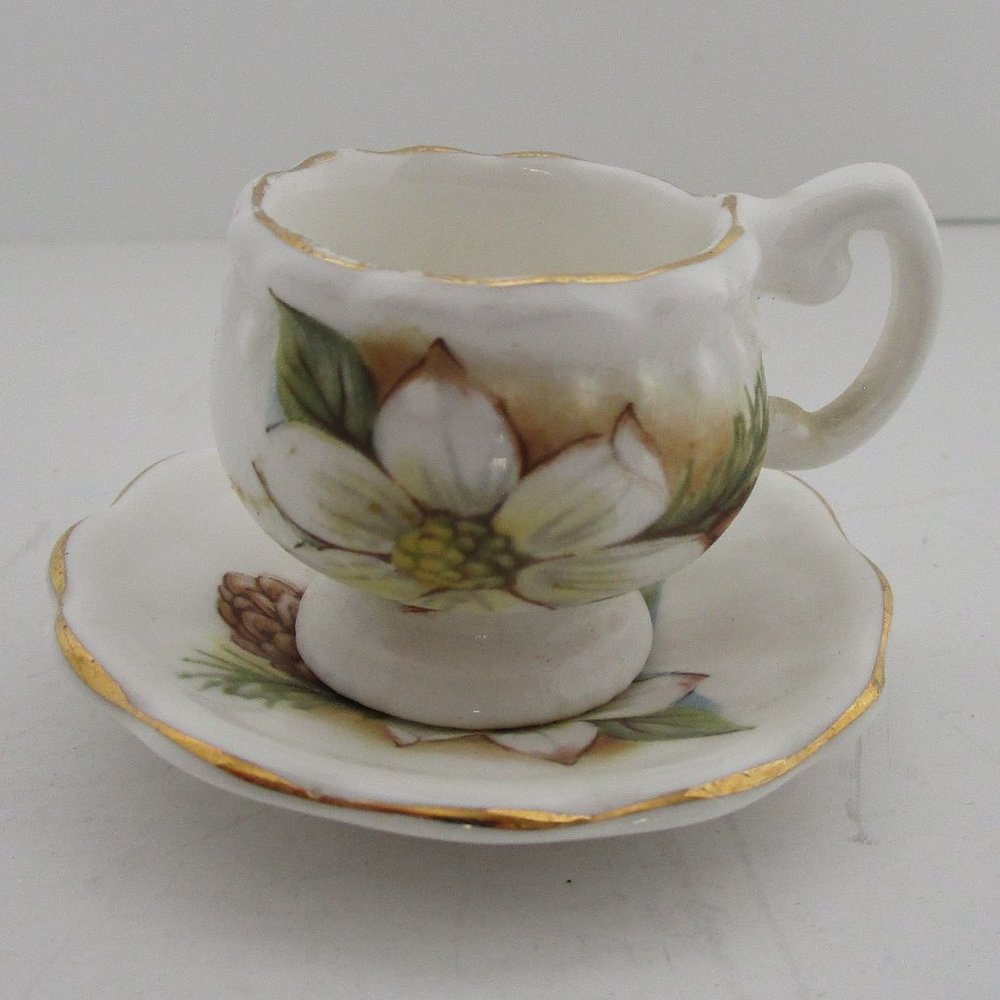 tiny cup and saucer set